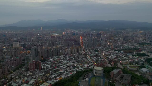 TAIWAN, TAIPEI - MAY, 2023: Aerial drone view of downtown city centre, with 101 Tower among crowded buildings in Xinyi District, Taipei