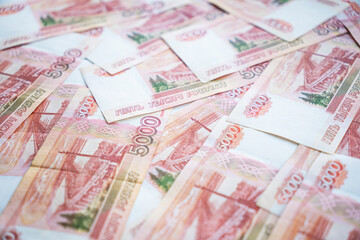 lot of Russian rubles on background. Many 5000 rubles bills.