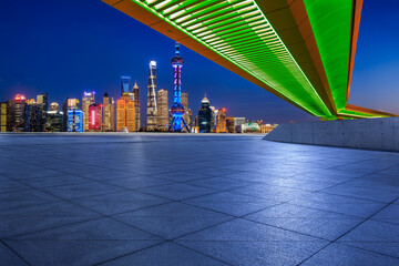 Empty square floor and city skyline with modern buildings in Shanghai, China.