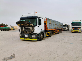 malfunctioned truck at a stop in the desert