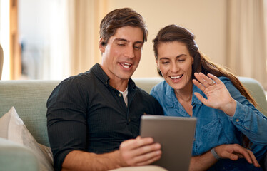Young couple, sofa and video call on tablet with wave, hello and smile for communication on internet app. Man, woman and happy for talking, chat or hello on social media, web and relax in home lounge