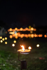 burning candle in the dark