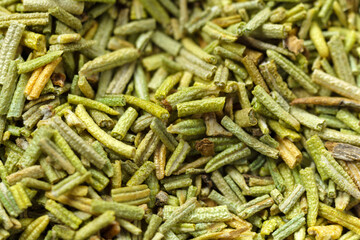 Dry spice rosemary close-up. Spices and herbs for cooking, macro view.