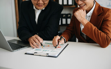 Business team meeting present.professional investor working with  Finance managers task. with laptop smart phone and digital tablet