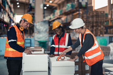 Warehouse workers organize products by size, shape, category. Handle customer orders by collecting items from storage, wrapping, sealing, packing, labeling them for shipment. Preparing delivery date. - obrazy, fototapety, plakaty