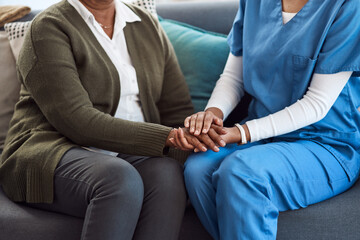 Counseling, woman or nurse holding hands for support or empathy for healthcare service of cancer therapy. Closeup, psychology help or sick patient in consulting with a caregiver in consultation