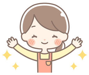 バンザイをして喜ぶエプロンの女性