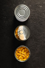 Canned food in blank metal jars, concept of canned food