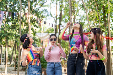 LGBTQIA Asian gay Supporters of the LGBTQ community. people having fun at LGBT pride parade. Gender Spectrum