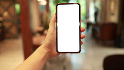 Women's hands holding cell telephone blank copy space screen. smartphone with blank white screen isolated on white background . smart phone with technology concept