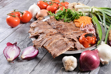 Meat Doner with pita, Bulgur pilaf, onion and grilled vegetables