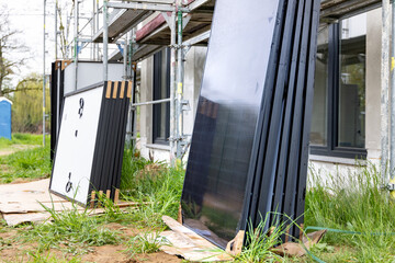 Several solar panels on a construction site prior to installation