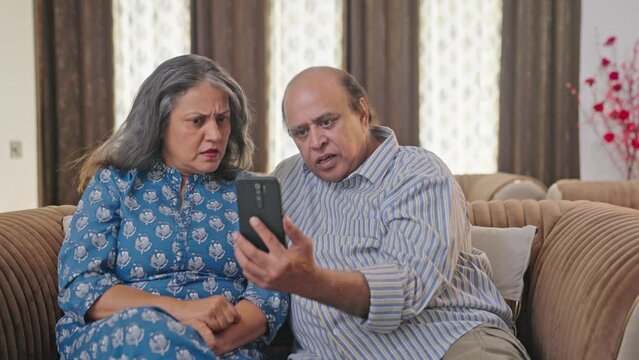 Angry Indian parents talking to children on video call