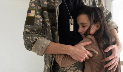 Soldier reunited with his daughter.
