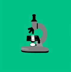 Microscope on green background, looking at small objects