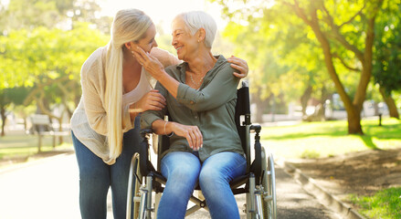 Hug, woman and senior mother at the park, wheelchair and happiness with joy, weekend break or...