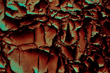 Macro texture of cracked paint on the surface. Vintage background in trendy warm colors. detailed texture