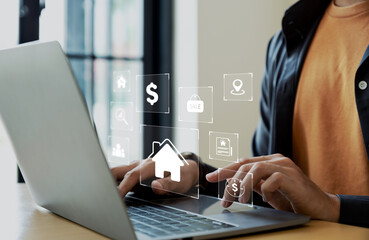 House mortgage loan concept. Businessman using laptop for property sales listings, realtor agency...