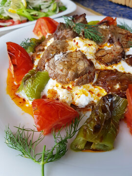 alinazik kebab served on a plate with yoghurt