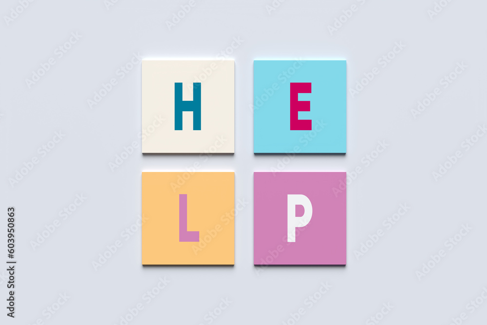 Poster support and help concept. the word help on colorful square blocks.