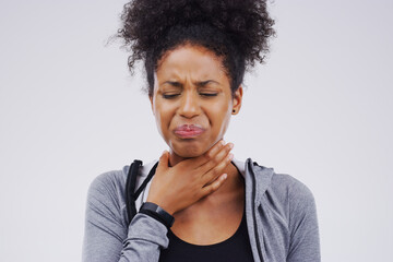 Black woman, sore throat and virus from cough, allergies or bacteria against a white studio...