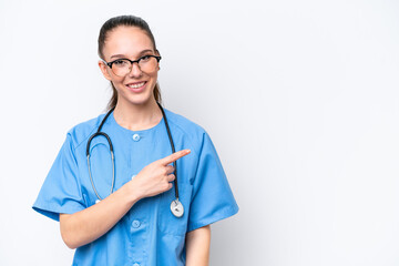 Young caucasian surgeon doctor woman isolated on white background pointing to the side to present a product
