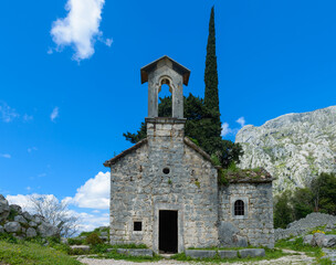 Ruined medieval church in the mountains near the city of Kotor in Montenegro - 603962445