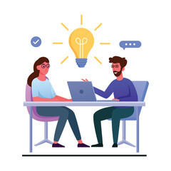 A man and woman sitting at a desk with a light bulb above them