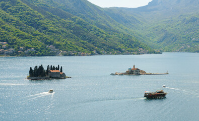 two islands (St George and Our Lady of the Rocks) off the coast of Perast in the Bay of Kotor. Montenegro - 603963056