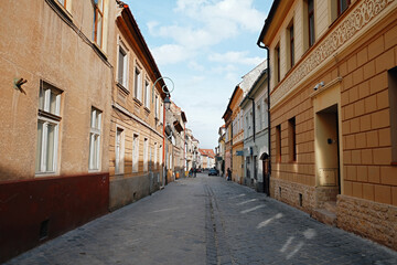 Postavaru Street, medieval pedestrian street in the Old city of Brasov, Transylvania, Romania