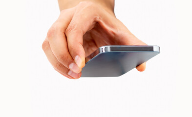 Closeup of hand holding up a smart phone with a white background