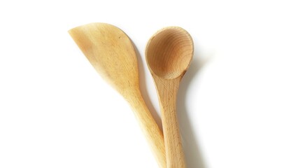 Wooden spatula and cooking spoons. Utensils for the kitchen prepare to cooking food isolated on white background