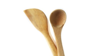 Wooden spatula and cooking spoons. Utensils for the kitchen prepare to cooking food isolated on white background