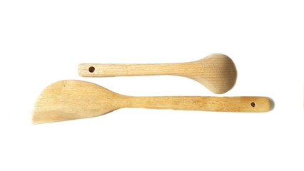 Wooden spatula and cooking spoons. Utensils for the kitchen prepare to cooking food isolated on white background