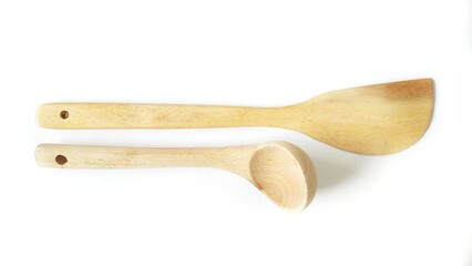 Wooden spatula and cooking spoons. Utensils for the kitchen prepare to cooking food isolated on white background