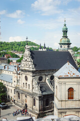 Fototapeta premium Lviv, aerial view from city hall. View of the roofs of a medieval city. View of Lviv city, Ukraine. Old town roofs in Gothic style.