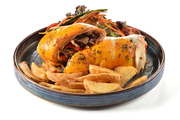 Enchilada with meat, apple slice potatoes and some green salad