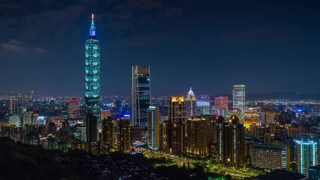 TAIWAN, TAIPEI - MAY, 2023: Timelapse view footage of the busy city centre downtown streets at rush hour, with 101 Tower among crowded buildings in Xinyi District, Taipei