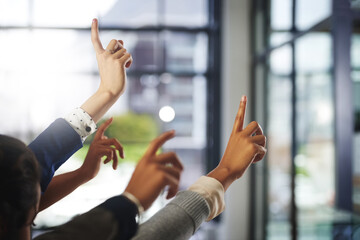 Hands up, workshop or business people in presentation asking questions for an answer or ideas. Teamwork, faq or employees with hand raised in group discussion meeting for problem solving or solution