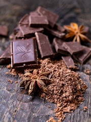 Ground cocoa and broken chocolate stars of anasol