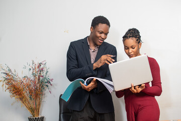 african business man and woman working together in office