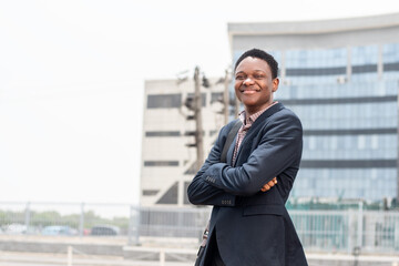 portrait of a young african businessman outdoors