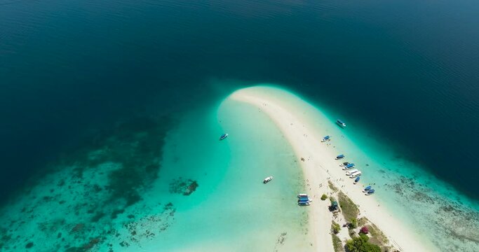 Top view of beautiful Sibuan island with a beach and a coral atoll. Tun Sakaran Marine Park. Borneo, Sabah, Malaysia.