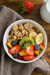 Healthy granola bowl with fruits strawberry