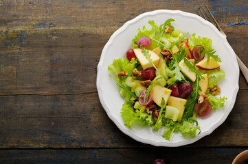 fresh healthy vegan salad with apple and celery