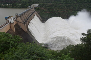 The Srisailam Dam is constructed Krishna River on the border of Mahabubnagar District, Telangana & Kurnool District, Andhra Pradesh near Srisailam temple town & is the 2nd largest capacity working 