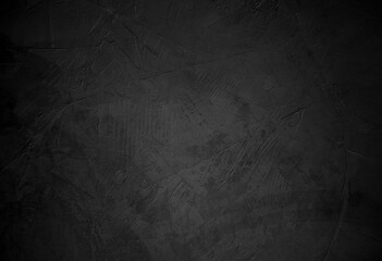 Dark black grunge stone textured concrete stone wall texture background with space for text or image.