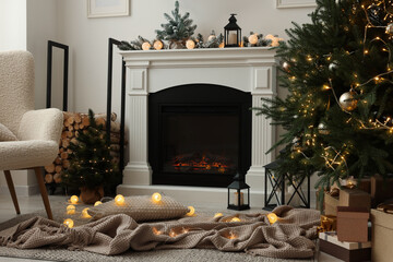 Cosy room with fireplace decorated for Christmas