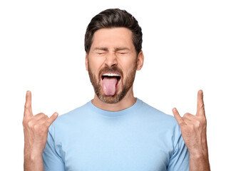 Man showing his tongue and rock gesture on white background