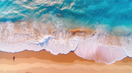Aerial top down view of ocean waves on the beach